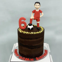 soccer player cake